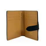 LOUIS VUITTON: Taurillon Capucines Vertical Compact Wallet