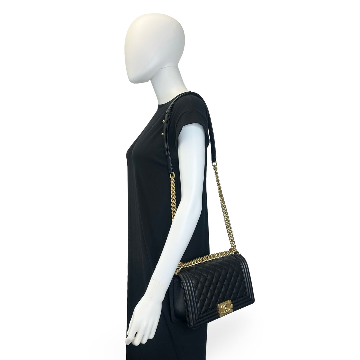 CHANEL: Quilted Caviar Old Medium Boy Bag