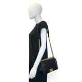 CHANEL: Quilted Caviar Old Medium Boy Bag