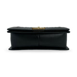CHANEL: Quilted Caviar Old Medium Boy Bag