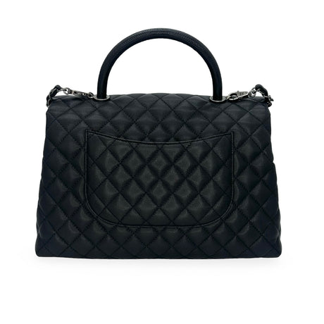 CHANEL: Quilted Caviar Medium Lizard Coco Top Handle Flap Bag