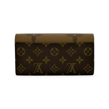 LOUIS VUITTON: Monogram Reverse Sarah Wallet