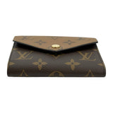 LOUIS VUITTON: Monogram Reverse Victorine Wallet