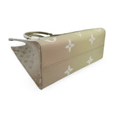 LOUIS VUITTON: Monogram Giant Spring in the City OntheGo MM