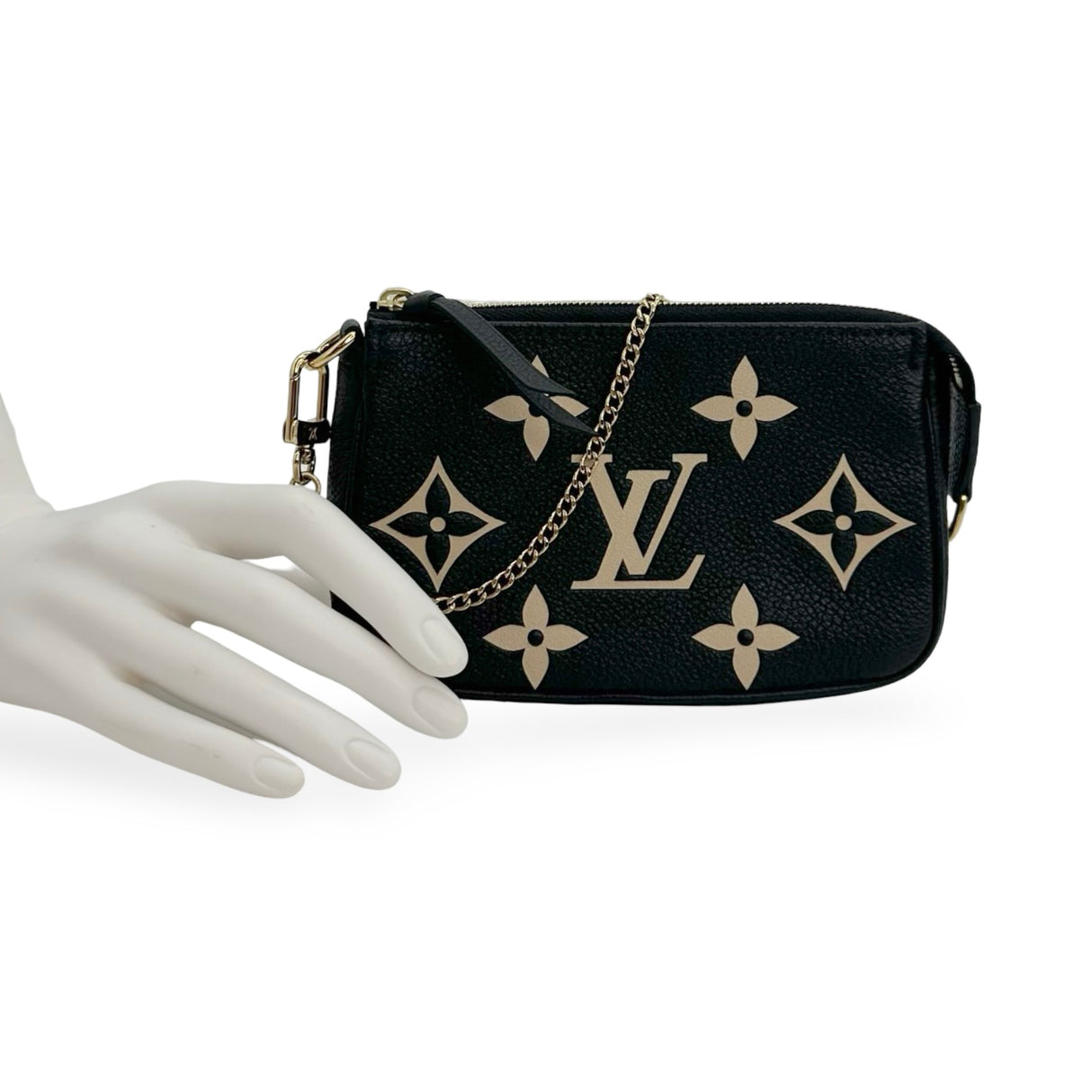 LOUIS VUITTON: Monogram Empreinte Bicolor Mini Pochette Accessoires