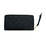LOUIS VUITTON: Monogram Empreinte Zippy Wallet