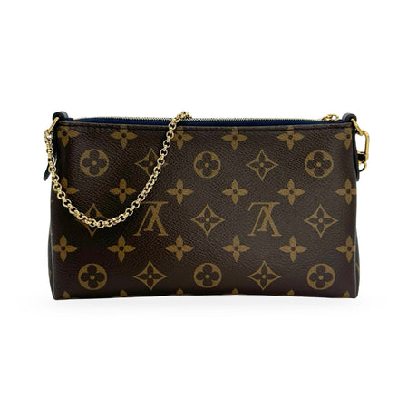 LOUIS VUITTON: Monogram Pallas Clutch