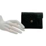LOUIS VUITTON: Monogram Empreinte Victorine Wallet