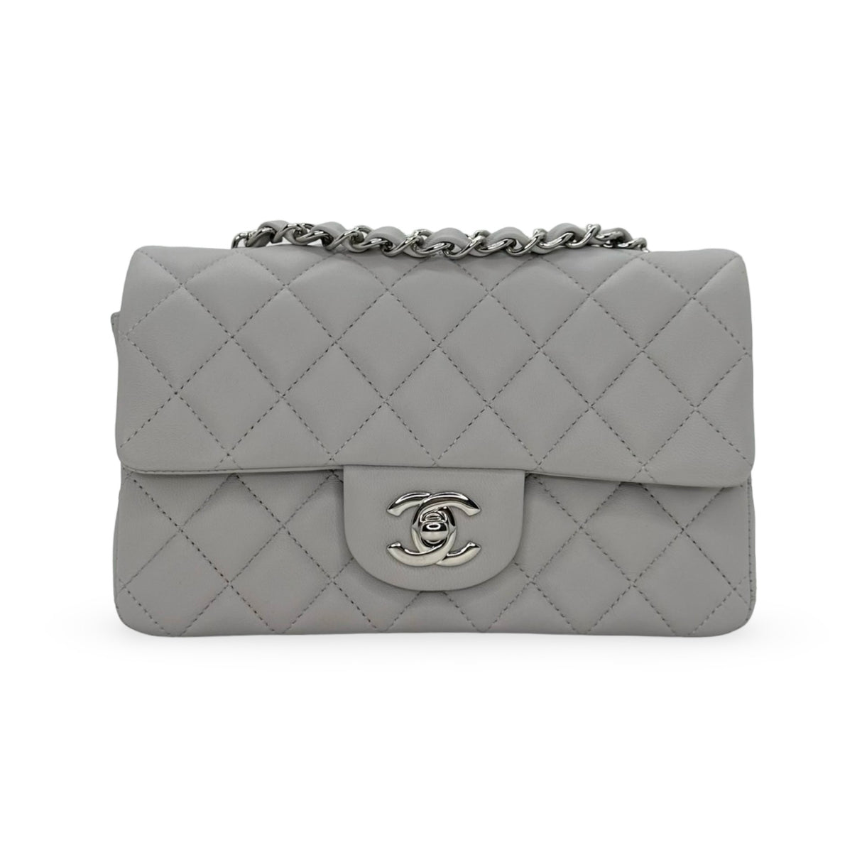 CHANEL: Quilted Lambskin Mini Classic Flap