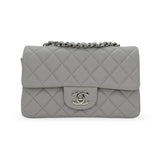 CHANEL: Quilted Lambskin Mini Classic Flap