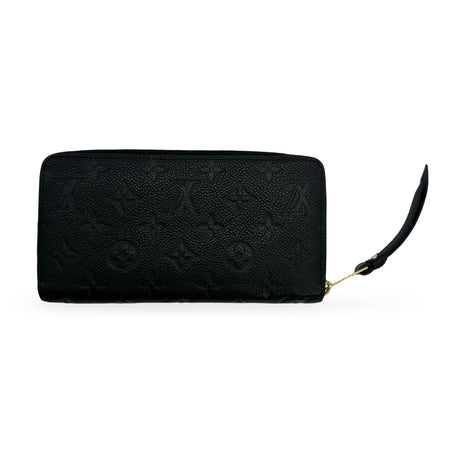 LOUIS VUITTON: Monogram Empreinte Zippy Wallet