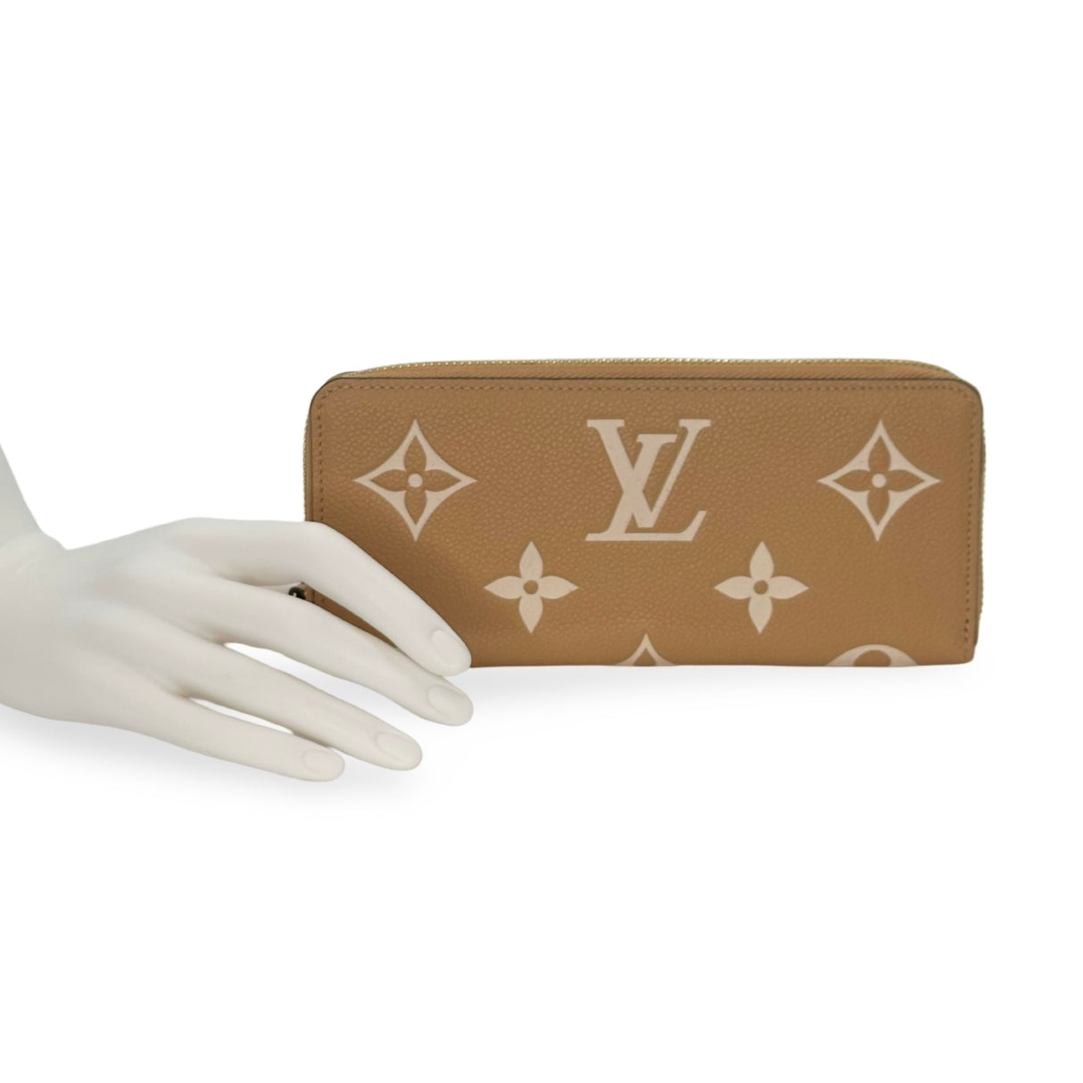 LOUIS VUITTON: Bicolor Monogram Empreinte Clemence Wallet