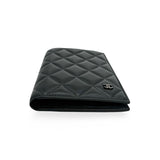 CHANEL: Quilted Lambskin Passport Holder