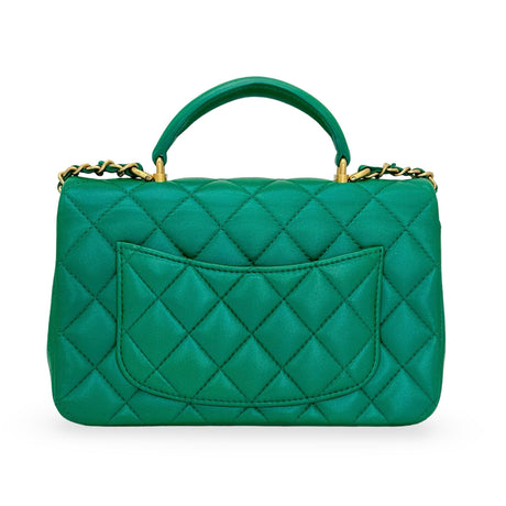 CHANEL: Iridescent Quilted Lambskin Mini Top Handle Flap Bag