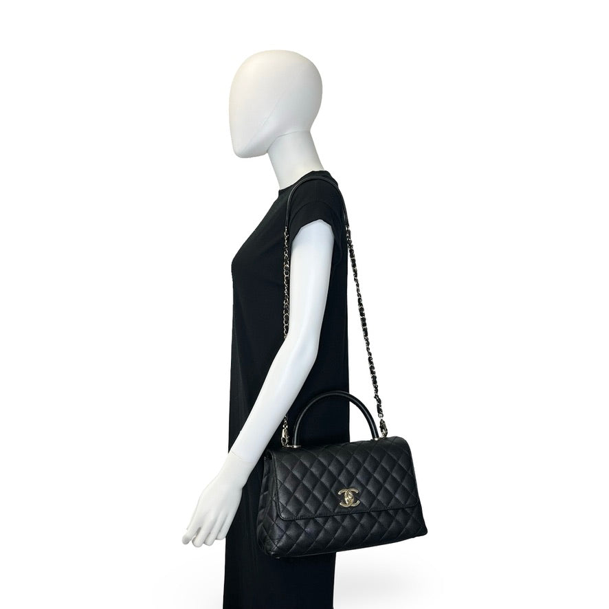 CHANEL: Quilted Caviar Small Coco Top Handle Flap Bag