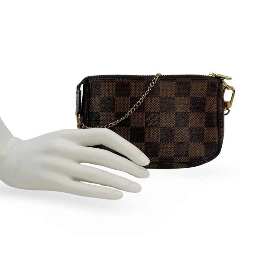 LOUIS VUITTON: Damier Ebene Mini Pochette Accessoires