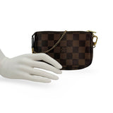 LOUIS VUITTON: Damier Ebene Mini Pochette Accessoires