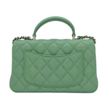CHANEL: Quilted Lambskin Mini Top Handle Flap bag