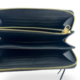 LOUIS VUITTON: Monogram Empreinte Zippy Wallet