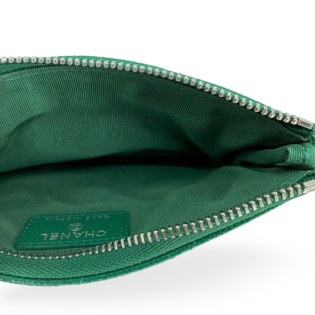 CHANEL: Quilted Caviar Small O Case Zip Pouch