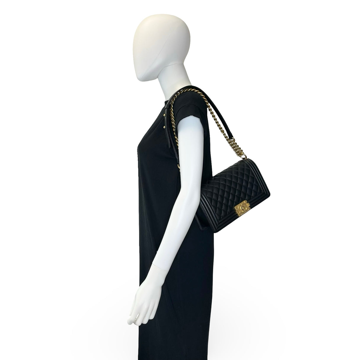 CHANEL: Quilted Caviar Old Medium Boy Bag