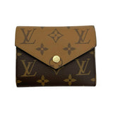 LOUIS VUITTON: Monogram Reverse Victorine Wallet