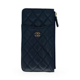 CHANEL: Quilted Caviar Phone Zip Card Case