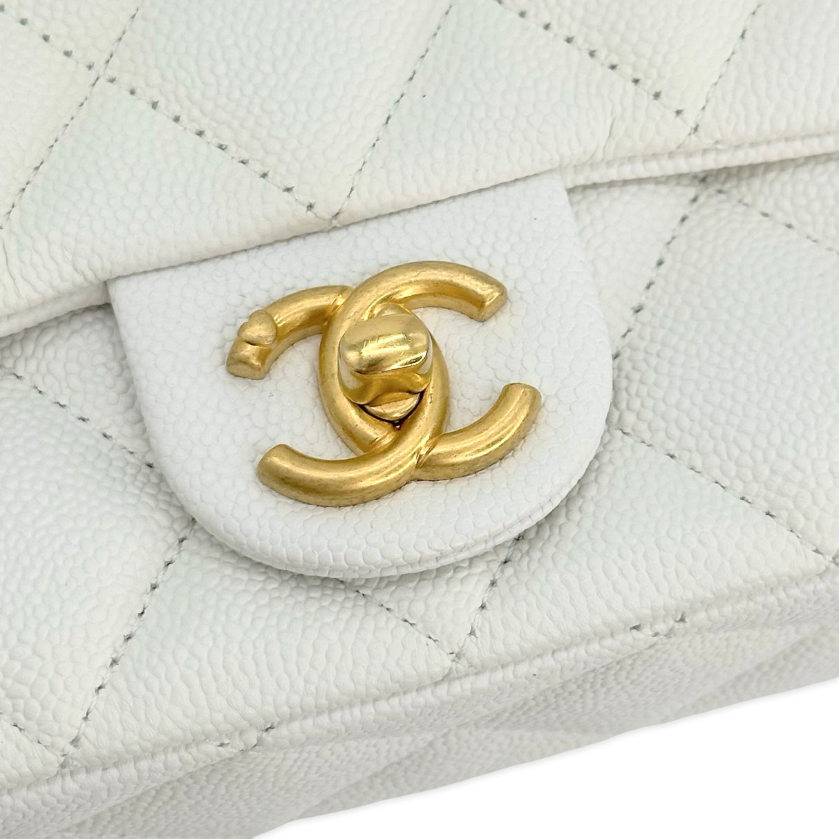 CHANEL: Quilted Caviar Sweetheart Mini Flap Bag