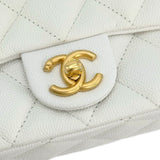 CHANEL: Quilted Caviar Sweetheart Mini Flap Bag