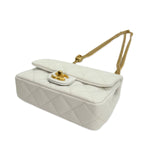 CHANEL: Quilted Caviar Sweetheart Mini Flap Bag