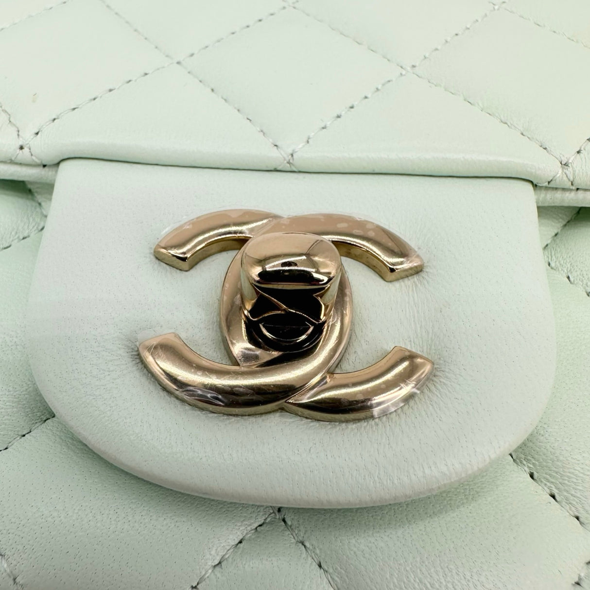 CHANEL: Quilted Lambskin Mini Classic Square Flap Bag