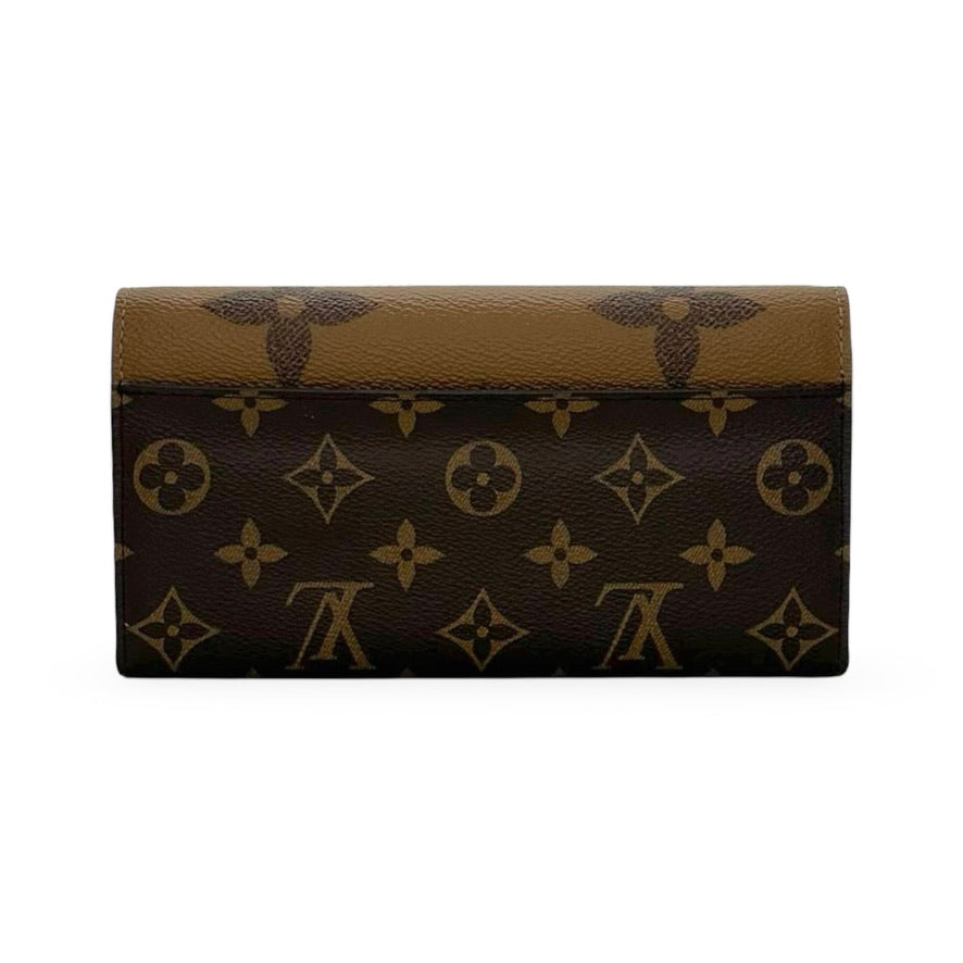 LOUIS VUITTON: Monogram Reverse Sarah Wallet