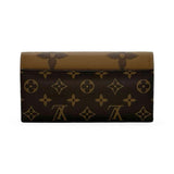 LOUIS VUITTON: Monogram Reverse Sarah Wallet