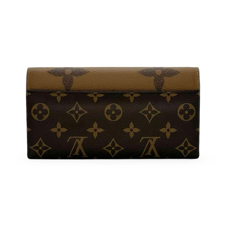 LOUIS VUITTON: Monogram Reverse Sarah Wallet