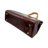 LOUIS VUITTON: Monogram Vernis Brea MM