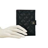 CHANEL: Quilted Caviar Classic Passport Holder Wallet