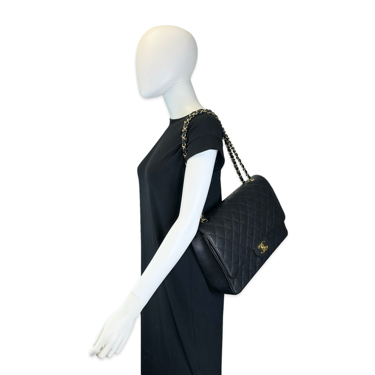 CHANEL: Quilted Caviar Maxi Classic Double Flap