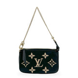 LOUIS VUITTON: Monogram Empreinte Bicolor Mini Pochette Accessoires