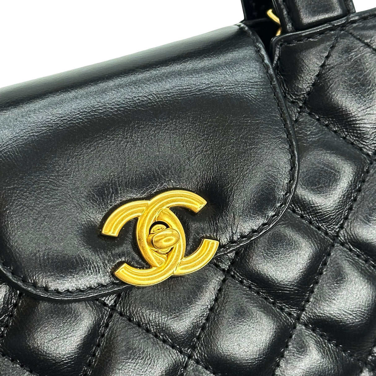 CHANEL: Quilted Calfskin Nano Kelly Top Handle Bag