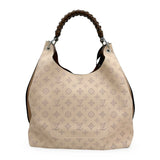 LOUIS VUITTON: Mahina Carmel Hobo Bag
