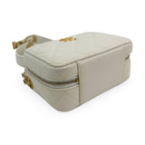 CHANEL: Quilted Caviar Twist Your Buttons Mini Vanity Case