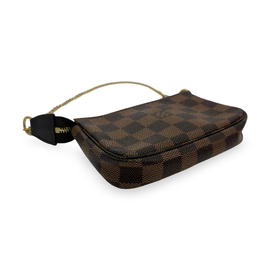 LOUIS VUITTON: Damier Ebene Mini Pochette Accessoires