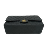 CHANEL: Quilted Caviar Maxi Classic Double Flap