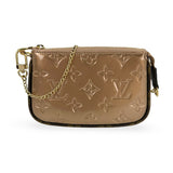 LOUIS VUITTON: Monogram Vernis Mini Pochette Accessoires