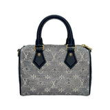 LOUIS VUITTON: Monoglam Jacquard Speedy Bandouliere 20